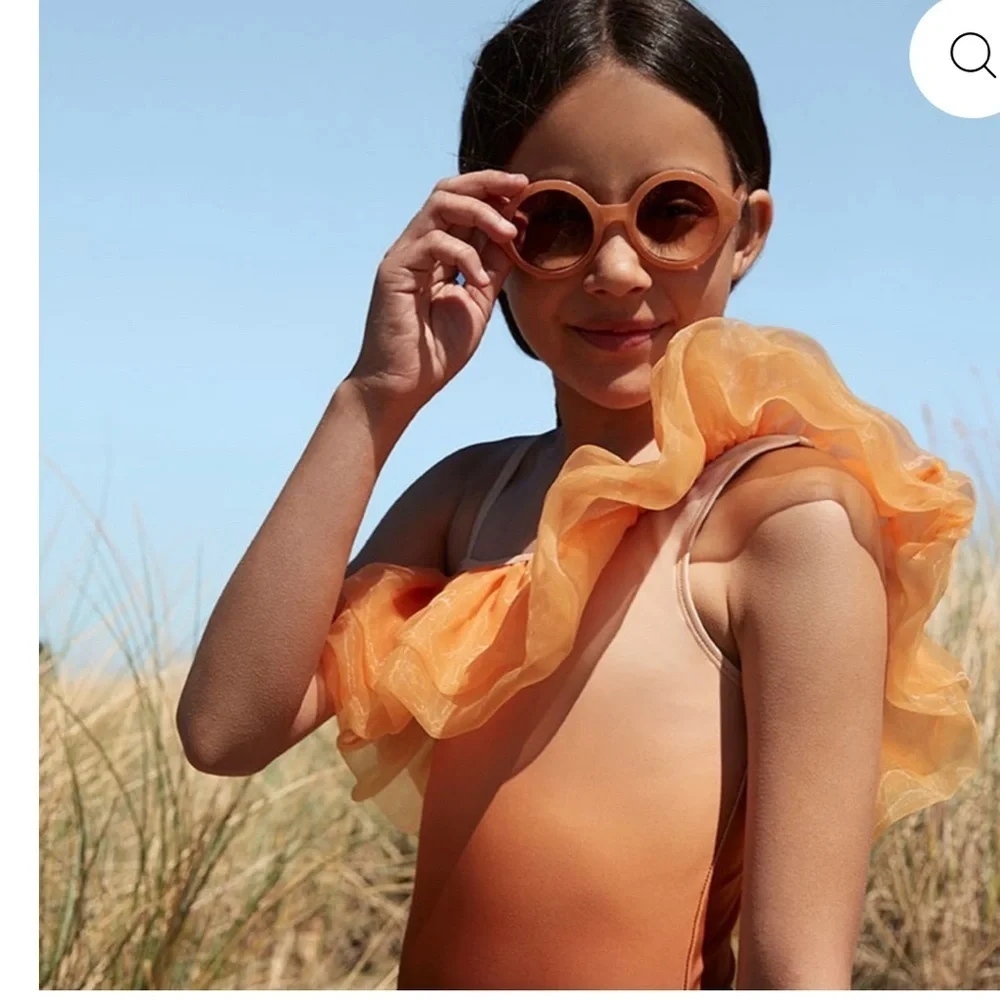 Orange and Brown Ruffled One-Shoulder Swimsuit by designer label, Molo